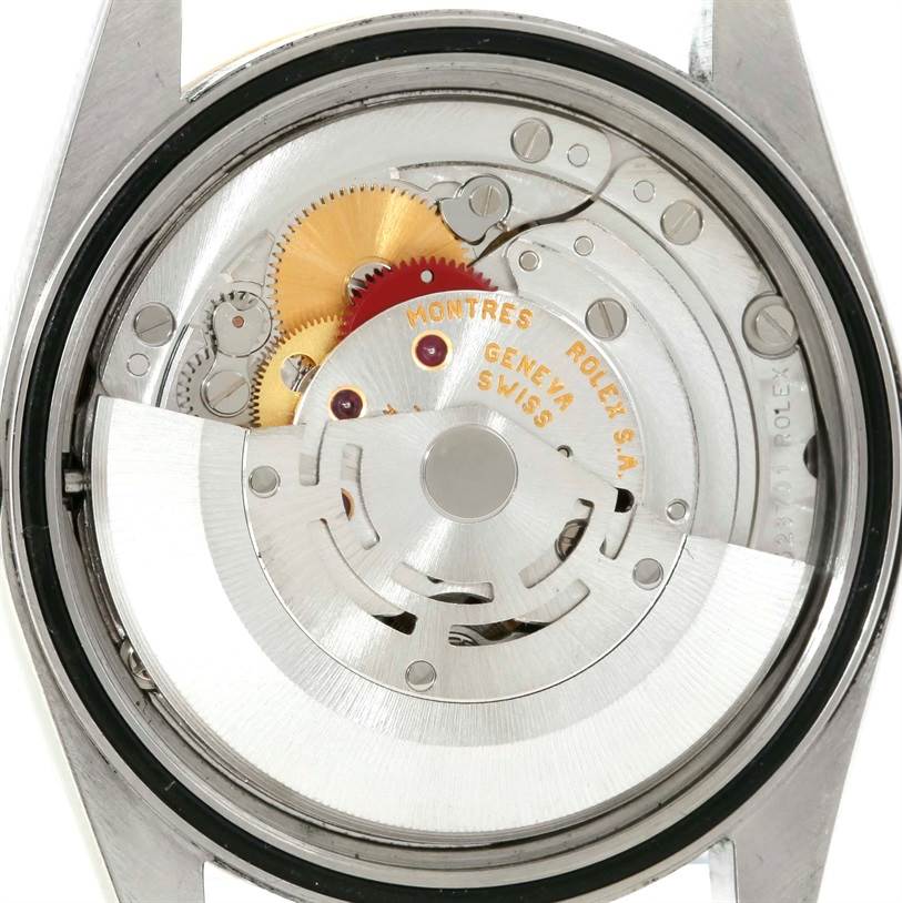 This image shows the inner mechanical movement of a Rolex Datejust 16233 Men's Steel and Gold (two tone) Champagne Dial 16233 Men's Steel and Gold (two tone) Champagne Dial watch, viewed from the back with the case opened.