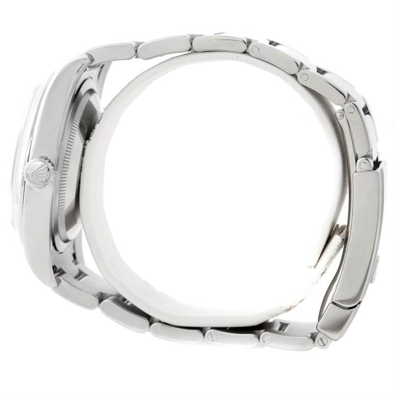 This image shows a side profile of the Rolex Datejust 116200 Men
s Stainless Steel Grey Dial 116200 Men
s Stainless Steel Grey Dial watch, highlighting its bracelet and partial case.