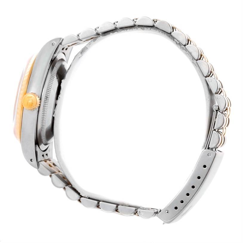 The image shows a side view of the Rolex Datejust 16233 Men's Steel and Gold (two tone) Champagne Dial 16233 Men's Steel and Gold (two tone) Champagne Dial watch, highlighting the crown, case, and bracelet.