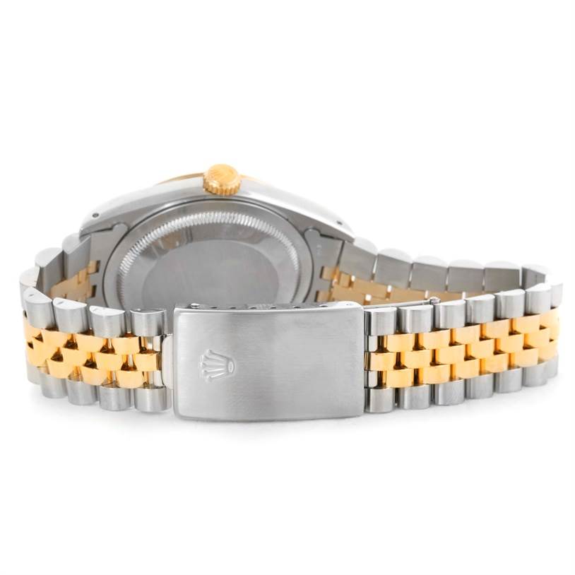 The image shows the back view of the Rolex Datejust 16233 Men's Steel and Gold (two tone) Champagne Dial 16233 Men's Steel and Gold (two tone) Champagne Dial watch, highlighting the case back and two-tone Jubilee bracelet.