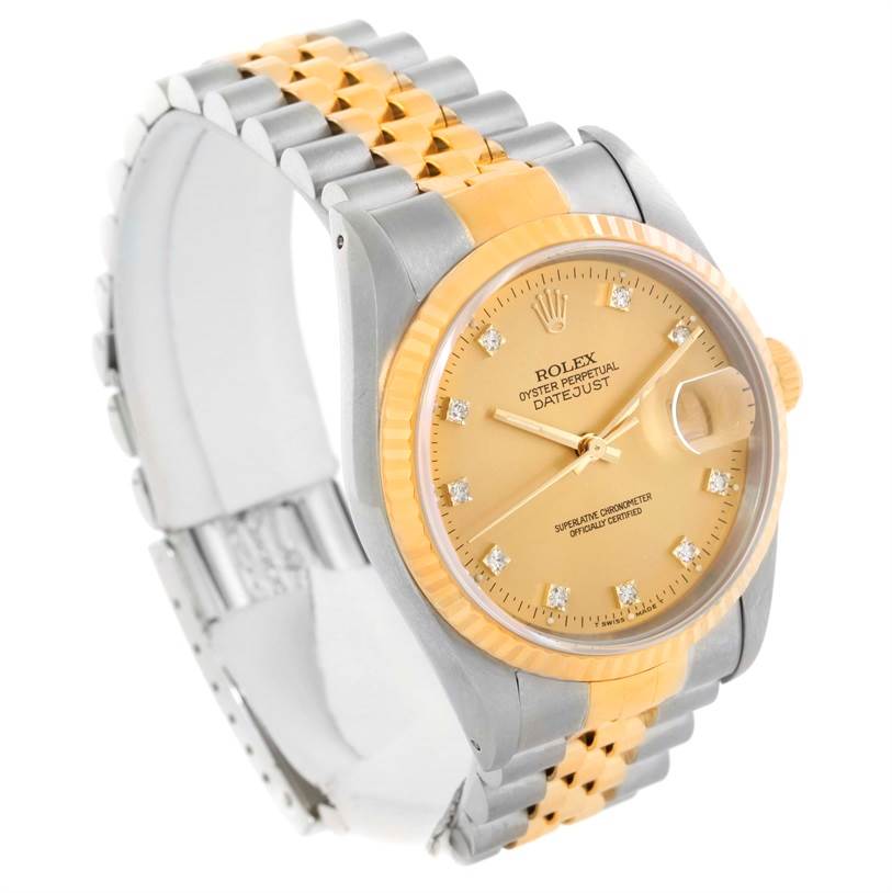 This image shows a Rolex Datejust 16233 Men's Steel and Gold (two tone) Champagne Dial 16233 Men's Steel and Gold (two tone) Champagne Dial watch at an angled view, highlighting its gold and stainless steel bracelet and gold dial with diamond markers.