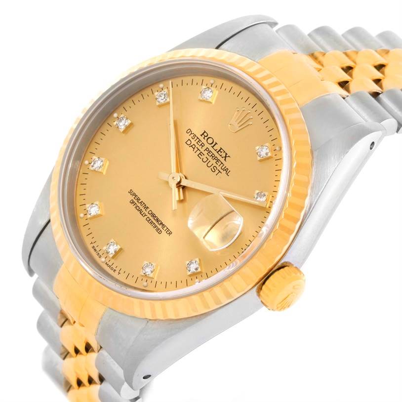 The image shows a close-up side angle of a Rolex Datejust 16233 Men's Steel and Gold (two tone) Champagne Dial 16233 Men's Steel and Gold (two tone) Champagne Dial watch, highlighting its gold bezel, crown, and diamond-accented dial.