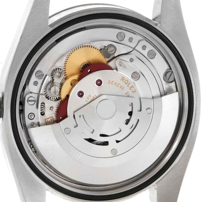 This image shows the backside view of the Rolex Datejust 116234 Men's Stainless Steel Silver Dial 116234 Men's Stainless Steel Silver Dial's movement, displaying its intricate mechanical components.