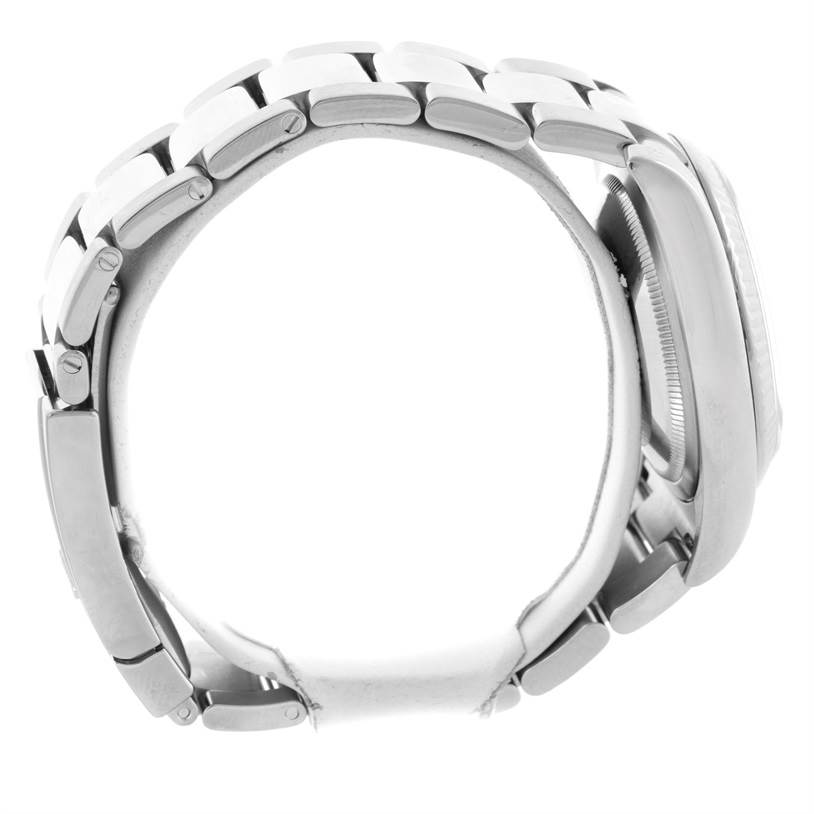 The image shows a side view of a Rolex Datejust 116234 Men's Stainless Steel Silver Dial 116234 Men's Stainless Steel Silver Dial watch, highlighting its metal bracelet and case.