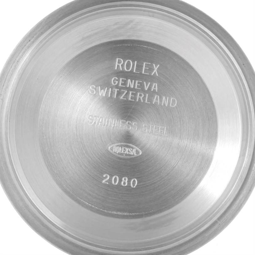 The image shows a close-up of the inner case back of a Rolex Datejust 116234 Men's Stainless Steel Silver Dial 116234 Men's Stainless Steel Silver Dial watch, displaying engraved details.