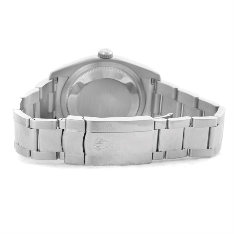 The image shows the rear view of a Rolex Datejust 116234 Men
s Stainless Steel Black Dial 116234 Men
s Stainless Steel Black Dial watch, highlighting its bracelet and clasp.