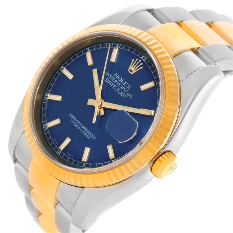 The image shows a Rolex Datejust 116233 Men's Stainless Steel Blue Dial 116233 Men's Stainless Steel Blue Dial watch from a side angle, highlighting its blue dial, gold bezel, and two-tone bracelet.