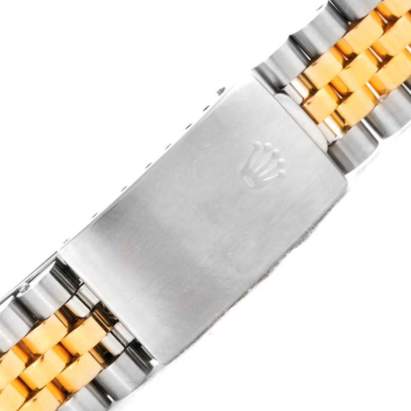 This image shows the clasp and bracelet of a Rolex Datejust 16233 Men's Steel and Gold (two tone) Champagne Dial 16233 Men's Steel and Gold (two tone) Champagne Dial watch in a close-up view.