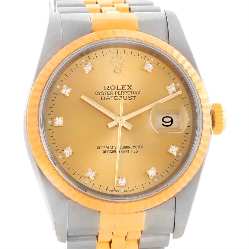 This image shows a frontal view of a Rolex Datejust 16233 Men's Steel and Gold (two tone) Champagne Dial 16233 Men's Steel and Gold (two tone) Champagne Dial watch, highlighting its dial, bezel, and part of its bracelet.