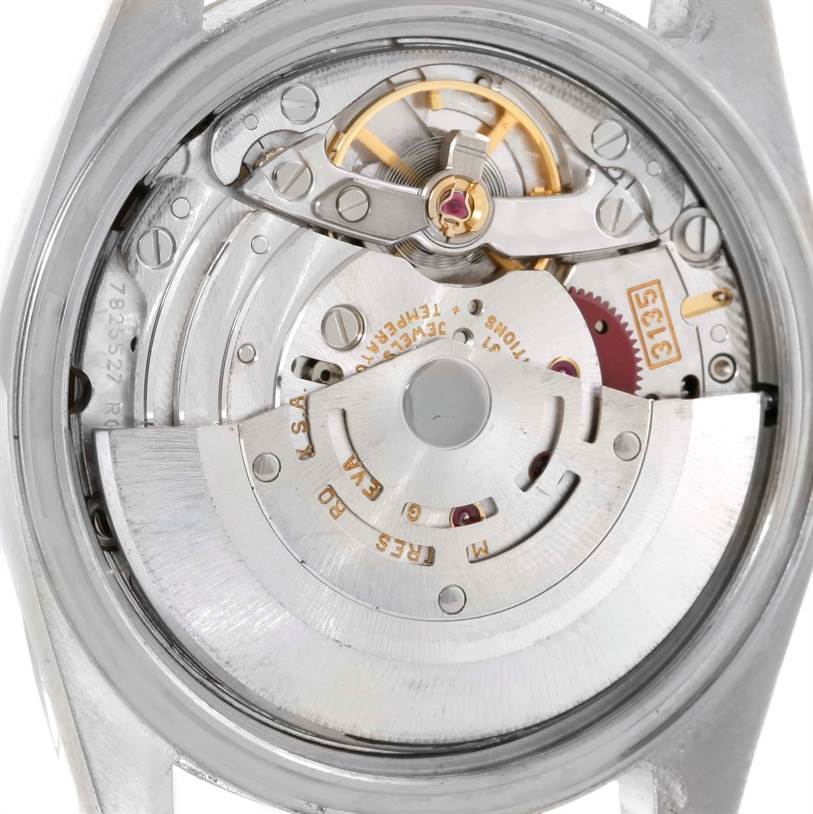 This image shows the inner mechanism of the Rolex Datejust 16233 Men's Steel and Gold (two tone) Champagne Dial 16233 Men's Steel and Gold (two tone) Champagne Dial watch from the back.