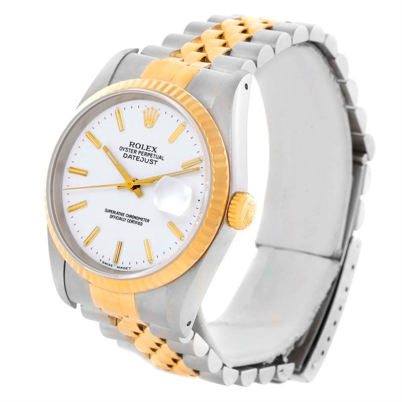 The image shows a Rolex Datejust 16233 Men
s Steel and Gold (two tone) White Dial 16233 Men
s Steel and Gold (two tone) White Dial watch angled slightly from the side, highlighting its face, bezel, and two-tone bracelet.