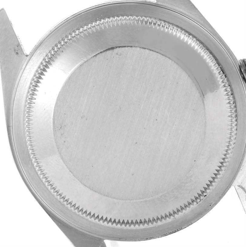 This image shows a close-up view of the case back of a Rolex Datejust 16233 Men
s Steel and Gold (two tone) Silver Dial 16233 Men
s Steel and Gold (two tone) Silver Dial watch.