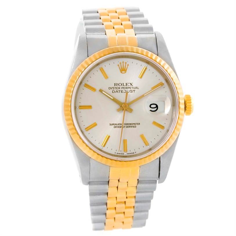 The Rolex Datejust 16233 Men
s Steel and Gold (two tone) Silver Dial 16233 Men
s Steel and Gold (two tone) Silver Dial watch is shown from a front angle, displaying its dial, two-tone bracelet, fluted bezel, and crown.