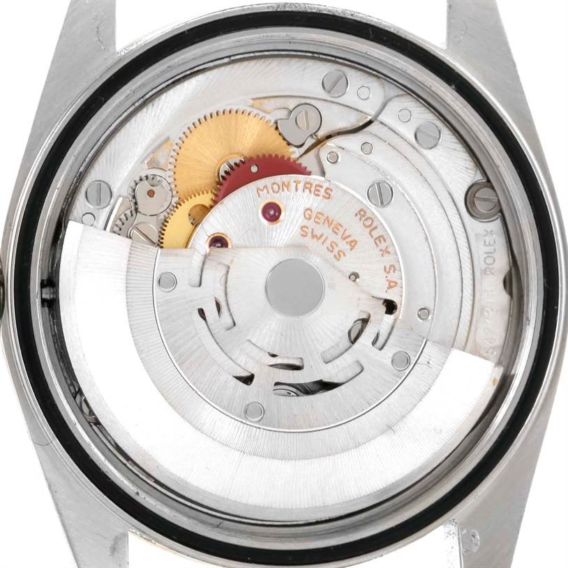 The image shows the movement and internal mechanism of a Rolex Datejust 16233 Men
s Steel and Gold (two tone) Silver Dial 16233 Men
s Steel and Gold (two tone) Silver Dial watch from a caseback view.