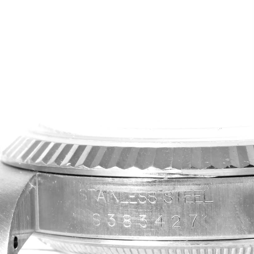 This image shows a close-up side view of the stainless steel case and bezel of a Rolex Datejust 16234 Men's Stainless Steel Silver Dial 16234 Men's Stainless Steel Silver Dial watch.