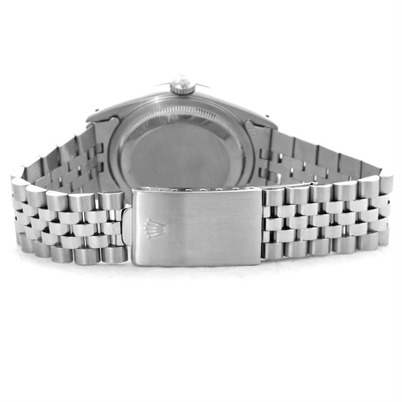 The image shows the backside of a Rolex Datejust 16234 Men's Stainless Steel Silver Dial 16234 Men's Stainless Steel Silver Dial watch, highlighting the clasp and bracelet.