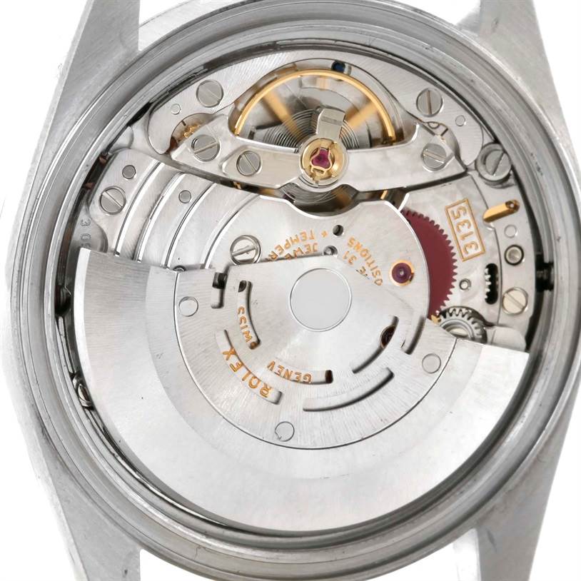 This image shows the inner mechanical parts of a Rolex Datejust 16234 Men
s Stainless Steel Pink Dial 16234 Men
s Stainless Steel Pink Dial watch viewed from the back.