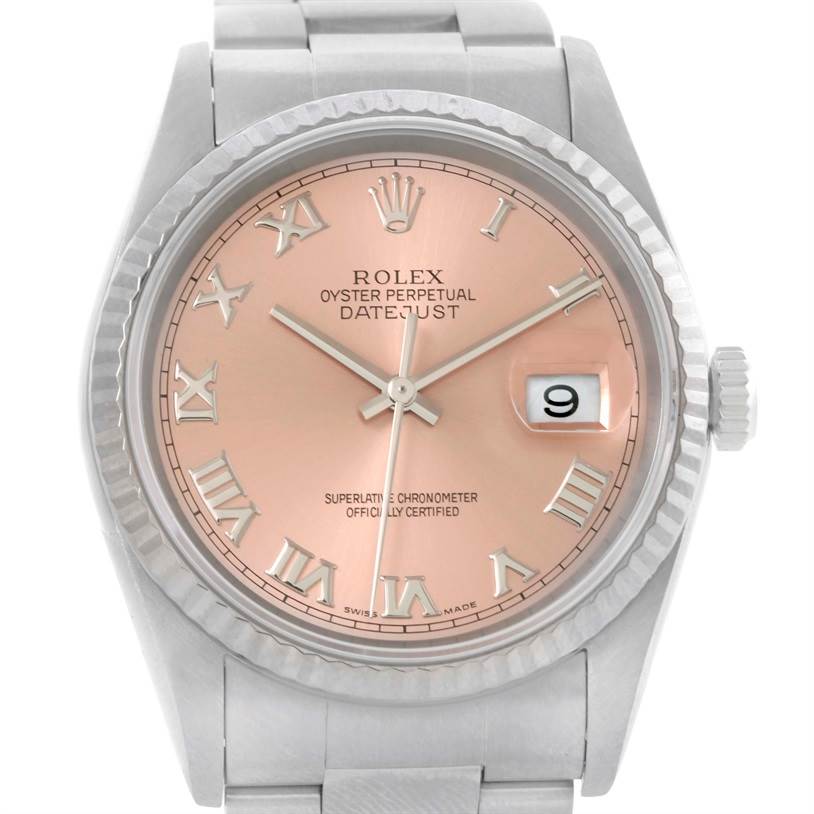 The image shows a close-up front view of a Rolex Datejust 16234 Men
s Stainless Steel Pink Dial 16234 Men
s Stainless Steel Pink Dial watch, highlighting its pink dial, Roman numerals, and date window.