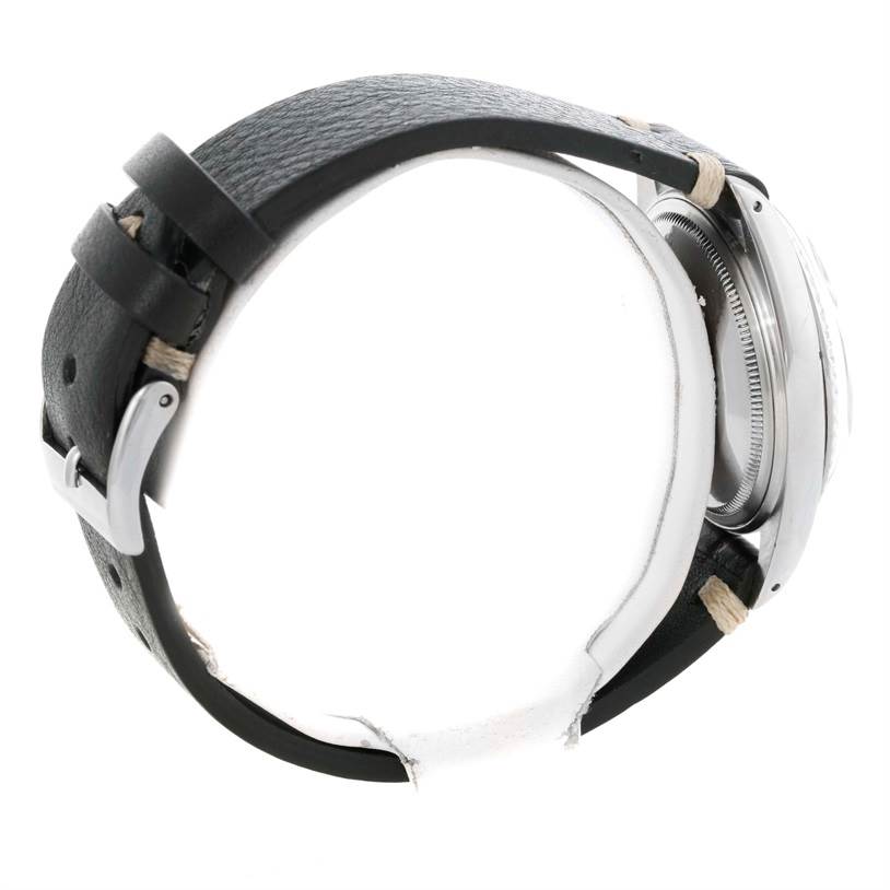 The image shows a side view of a Rolex Datejust 1603 Men's Stainless Steel Silver Dial 1603 Men's Stainless Steel Silver Dial watch, focusing on the leather strap and part of the watch case.