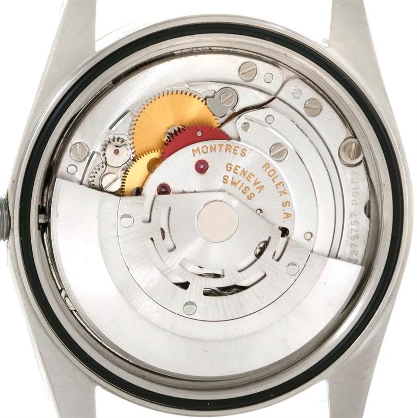 The image shows the movement mechanism of a Rolex Datejust 16233 Men's Steel and Gold (two tone) Champagne Dial 16233 Men's Steel and Gold (two tone) Champagne Dial watch from a back (caseback removed) perspective.