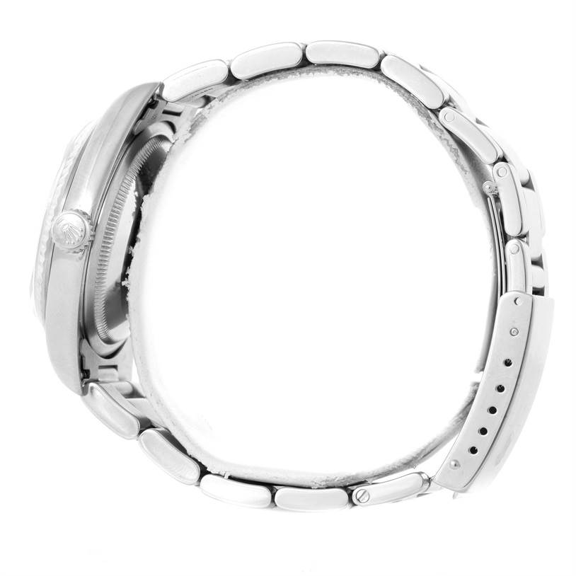 The image shows a side view of a Rolex Datejust 16234 Men's Stainless Steel Silver Dial 16234 Men's Stainless Steel Silver Dial watch, highlighting the bracelet, case, and crown.