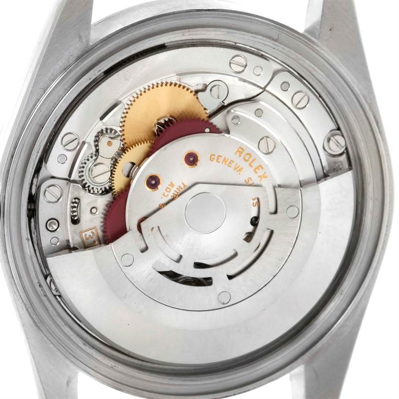 The image shows the internal mechanisms and gears of a Rolex Datejust 16234 Men's Stainless Steel Silver Dial 16234 Men's Stainless Steel Silver Dial watch from a back angle.