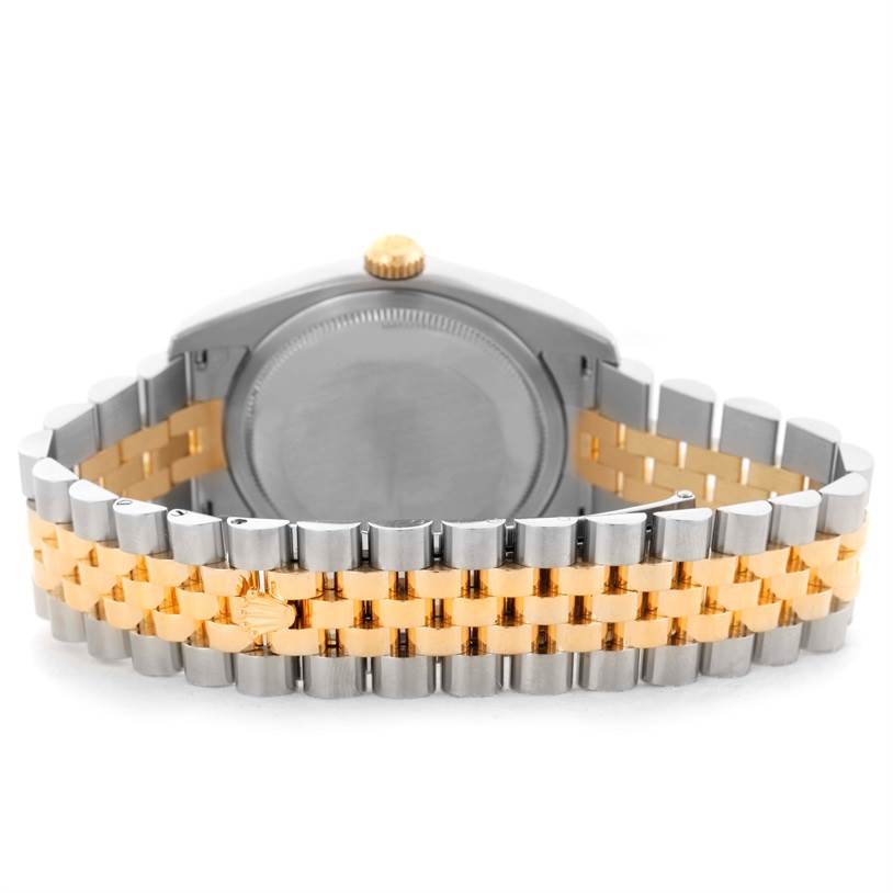 The image shows the back and bracelet of a Rolex Datejust 116233 Men
s Stainless Steel Champagne Dial 116233 Men
s Stainless Steel Champagne Dial watch, highlighting the two-tone jubilee bracelet and case back.