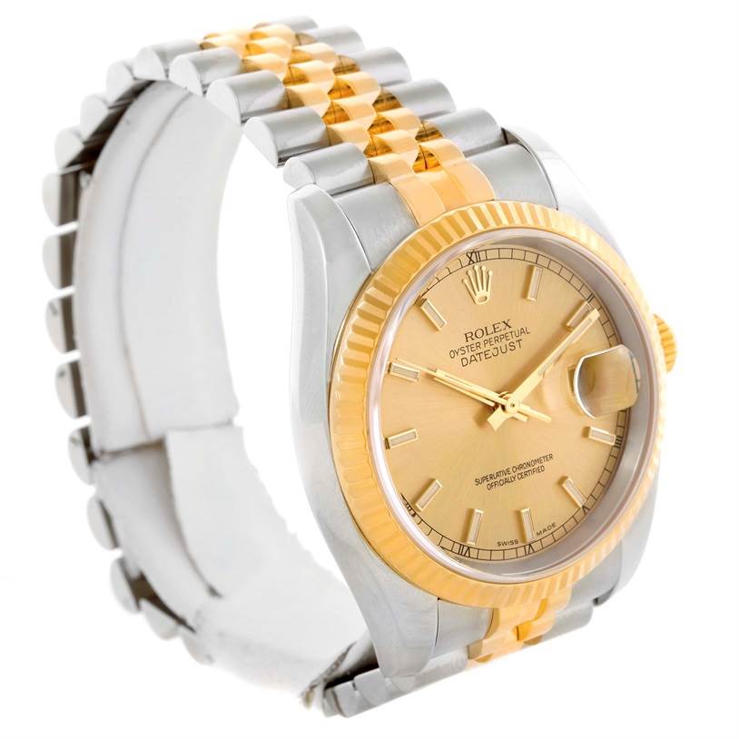 The image shows a side angle view of a Rolex Datejust 116233 Men
s Stainless Steel Champagne Dial 116233 Men
s Stainless Steel Champagne Dial watch, highlighting its gold dial, fluted bezel, and two-tone bracelet.
