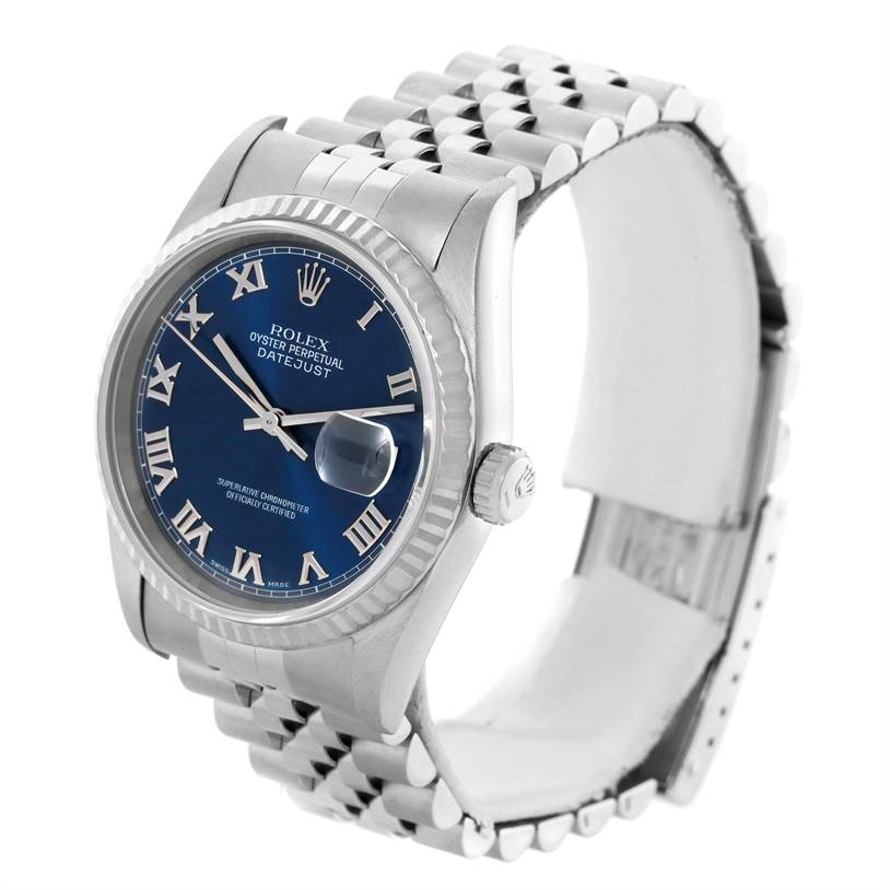 The Rolex Datejust 16234 Men's Stainless Steel Blue Dial 16234 Men's Stainless Steel Blue Dial watch is shown at a slight angle, displaying its blue dial, Roman numerals, fluted bezel, and Jubilee bracelet.