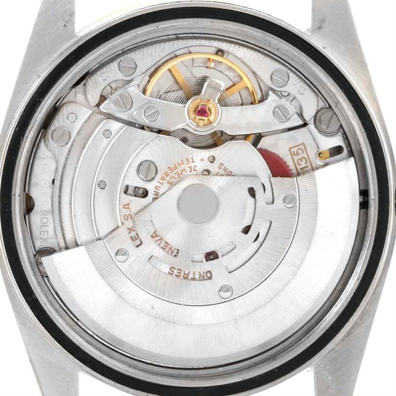 This image shows the movement mechanism of a Rolex Datejust 16233 Men's Steel and Gold (two tone) Silver Dial 16233 Men's Steel and Gold (two tone) Silver Dial watch from a close-up, top-down angle.