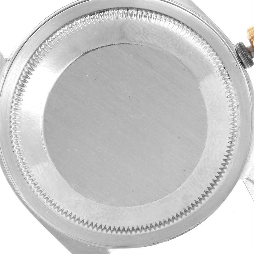 The close-up image shows the case back of a Rolex Datejust 16233 Men's Steel and Gold (two tone) Silver Dial 16233 Men's Steel and Gold (two tone) Silver Dial watch from a top-down angle.