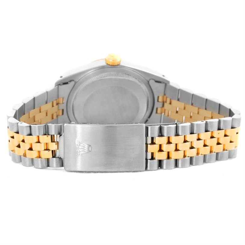 The image shows the back view of a Rolex Datejust 16233 Men's Steel and Gold (two tone) Silver Dial 16233 Men's Steel and Gold (two tone) Silver Dial watch, highlighting its bracelet and clasp.