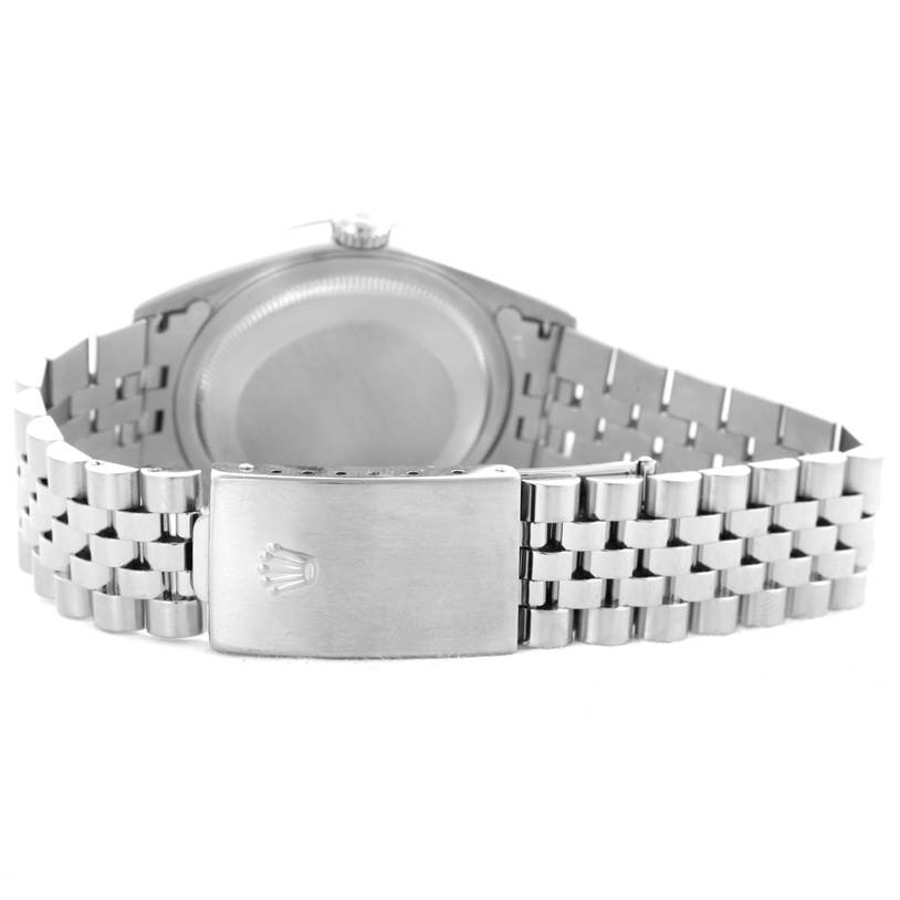 The image shows the back view of a Rolex Datejust 16220 Men
s Stainless Steel Black Dial 16220 Men
s Stainless Steel Black Dial watch, focusing on the clasp and bracelet.