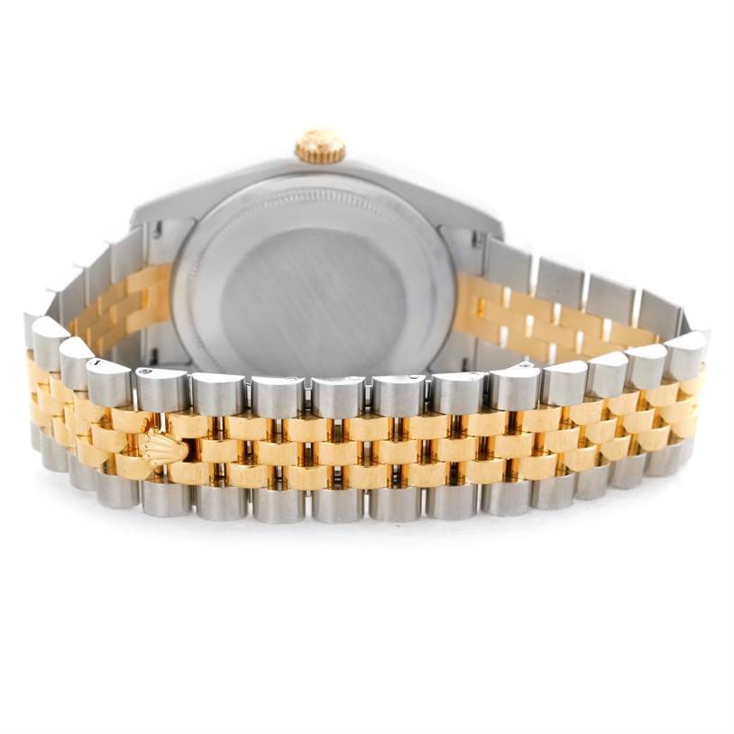 The image shows the back of a Rolex Datejust 116233 Men's Stainless Steel Champagne Dial 116233 Men's Stainless Steel Champagne Dial watch, focusing on the two-tone bracelet and case back.