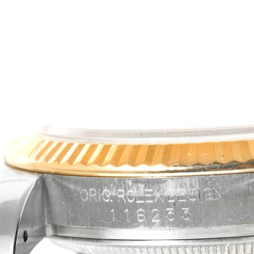The image shows a close-up of the Rolex Datejust 116233 Men's Stainless Steel Champagne Dial 116233 Men's Stainless Steel Champagne Dial watch bezel and part of the case, highlighting the model number "116233."