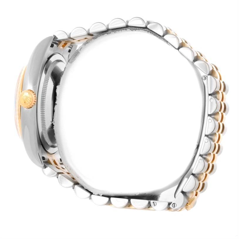 The image shows a side view of a Rolex Datejust 116233 Men's Stainless Steel Champagne Dial 116233 Men's Stainless Steel Champagne Dial watch, highlighting the crown and partial bracelet.