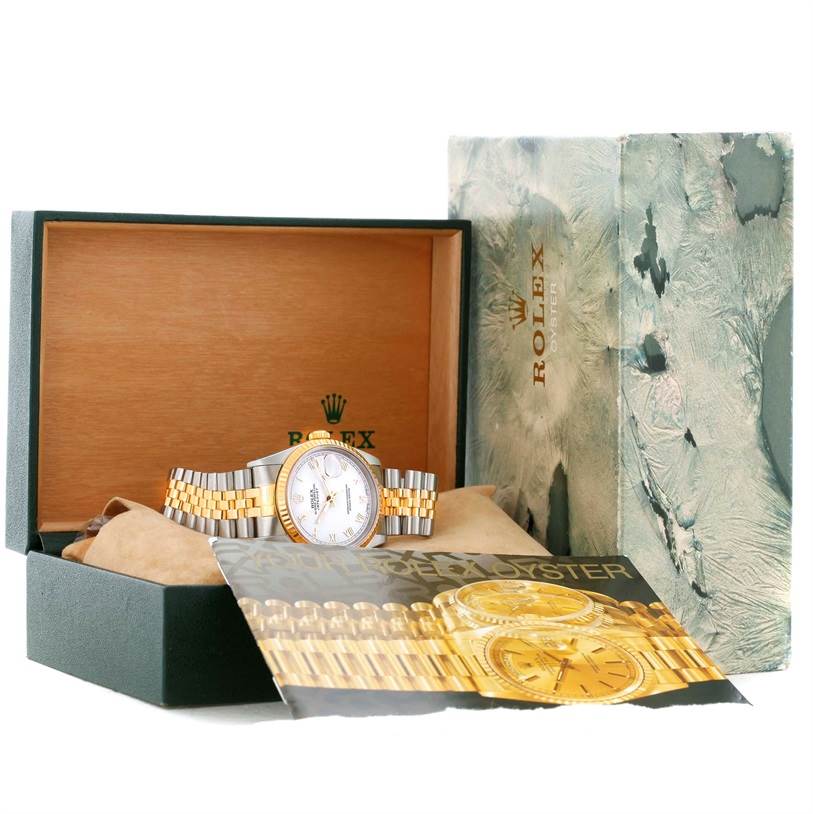 The Rolex Datejust 16233 Men's Steel and Gold (two tone) White Dial 16233 Men's Steel and Gold (two tone) White Dial watch is shown at an angle in its open box, with the warranty card and outer packaging also visible.