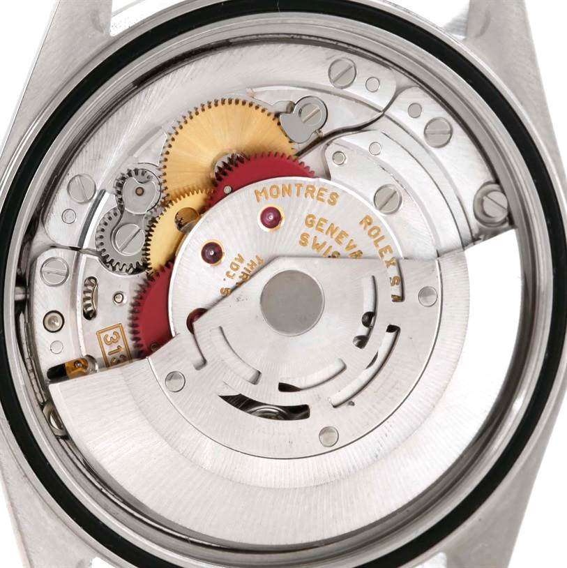 This image shows the open back view of the Rolex Datejust 16220 Men
s Stainless Steel Blue Dial 16220 Men
s Stainless Steel Blue Dial watch, revealing its internal mechanical movement parts.