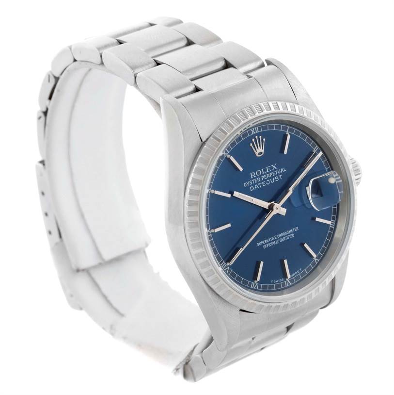 The Rolex Datejust 16220 Men
s Stainless Steel Blue Dial 16220 Men
s Stainless Steel Blue Dial watch is shown at a 3/4 angle, highlighting the blue dial, fluted bezel, and metal bracelet.