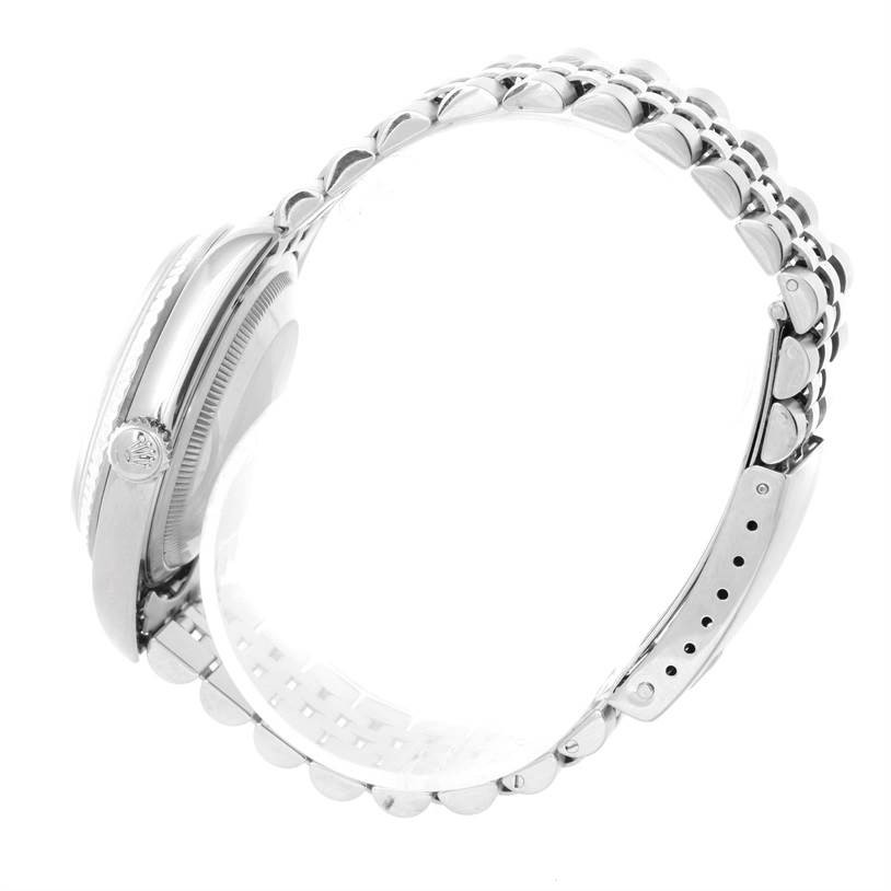 This image shows the side view of a Rolex Datejust 16234 Men's Stainless Steel White Dial 16234 Men's Stainless Steel White Dial watch, highlighting the case, crown, and part of the bracelet.