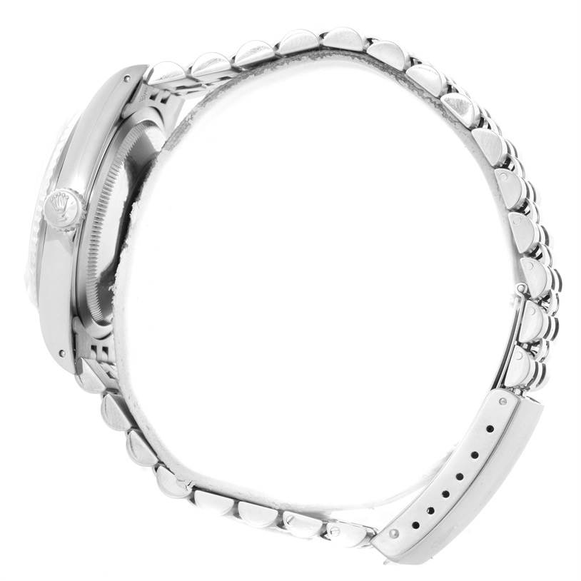 The image shows a side view of the Rolex Datejust 16234 Men's Stainless Steel White Dial 16234 Men's Stainless Steel White Dial watch, featuring its crown and part of the bracelet.