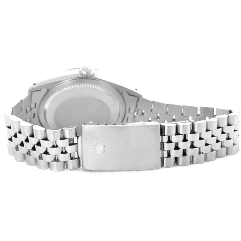 The image shows the backside of the watch case and the Jubilee bracelet of a Rolex Datejust 16234 Men's Stainless Steel Silver Dial 16234 Men's Stainless Steel Silver Dial model.