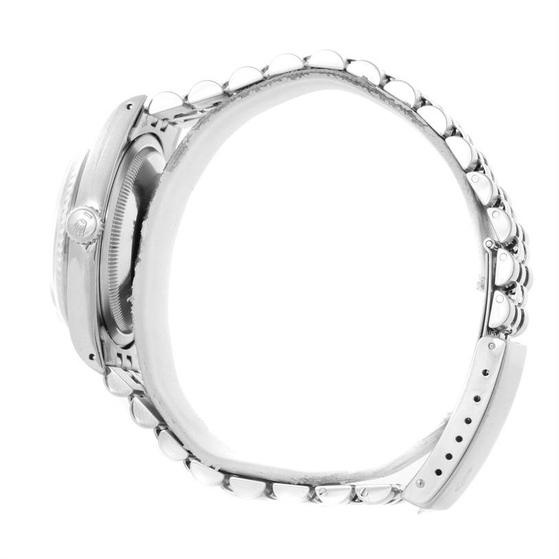 The image shows a side view of the Rolex Datejust 16234 Men's Stainless Steel Silver Dial 16234 Men's Stainless Steel Silver Dial watch, highlighting the clasp, bracelet, and crown.