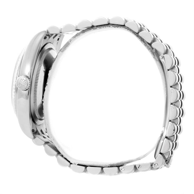The Rolex Datejust 116234 Men's Stainless Steel White Dial 116234 Men's Stainless Steel White Dial watch is shown from a side angle, highlighting its crown and bracelet links.