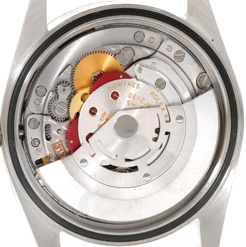 The image shows the back interior view of a Rolex Datejust 16233 Men's Steel and Gold (two tone) Beige Dial 16233 Men's Steel and Gold (two tone) Beige Dial, displaying its intricate mechanical movement.