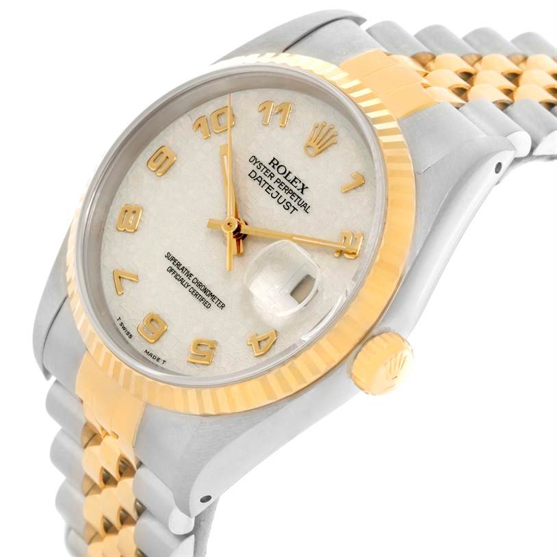 The image shows a Rolex Datejust 16233 Men's Steel and Gold (two tone) Beige Dial 16233 Men's Steel and Gold (two tone) Beige Dial watch at a tilted angle, displaying the dial, crown, and part of the band.