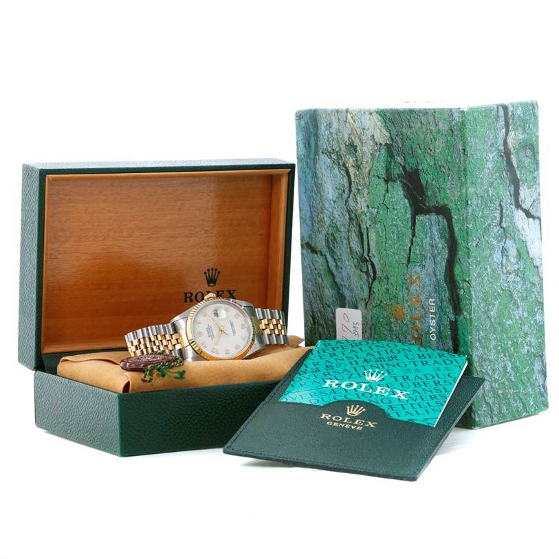 The image shows a Rolex Datejust 16233 Men's Steel and Gold (two tone) Beige Dial 16233 Men's Steel and Gold (two tone) Beige Dial watch at an angled view, with its box, external packaging, and accompanying documentation.