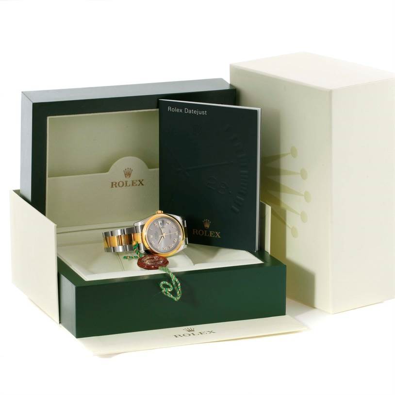 The image shows a Rolex Datejust 116203 Men's Stainless Steel Grey Dial 116203 Men's Stainless Steel Grey Dial watch at an angled view, within its open packaging, alongside a booklet and accessories.