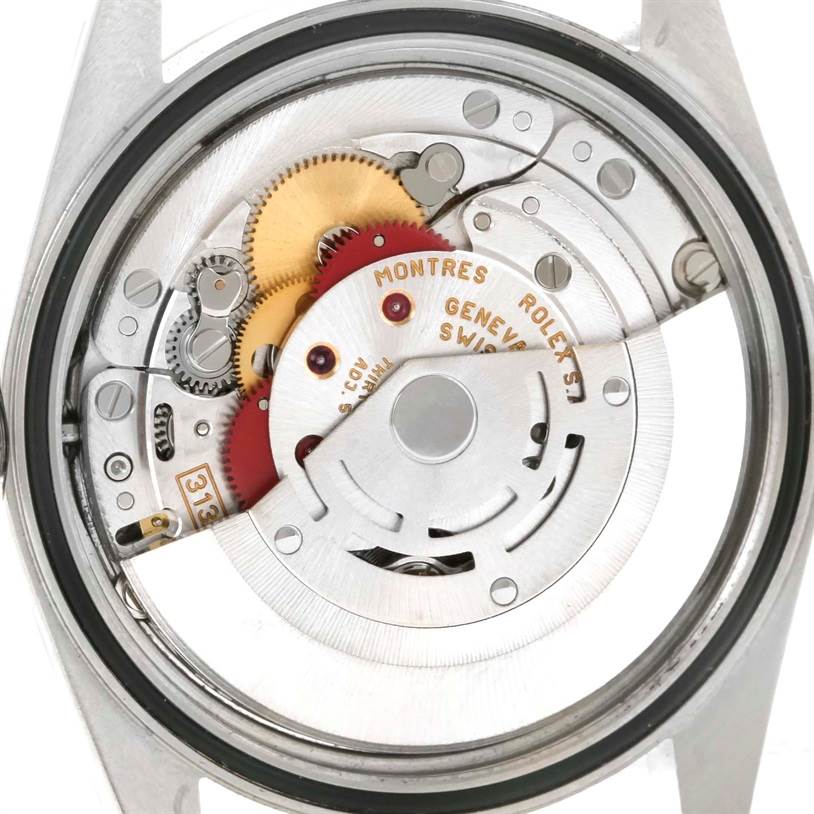 The image shows the movement and internal mechanisms of a Rolex Datejust 16233 Men's Steel and Gold (two tone) Silver Dial 16233 Men's Steel and Gold (two tone) Silver Dial watch from a back angle.