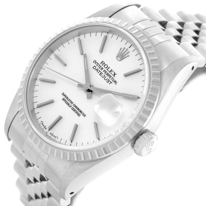 The image shows the face and crown of the Rolex Datejust 16220 Men
s Stainless Steel White Dial 16220 Men
s Stainless Steel White Dial watch at an angle, highlighting its bracelet and fluted bezel.